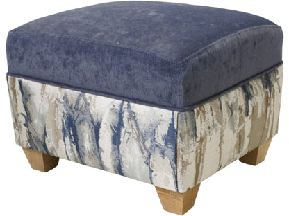 Oxford footstool in Takara Indigo with light wood feet 